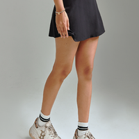 Black Tennis Skirt in Malaysia. Highwaist with mini length hem. Perfect for golf, paddleground, tennis and pickleball. Ace your game with our tennis outfit.