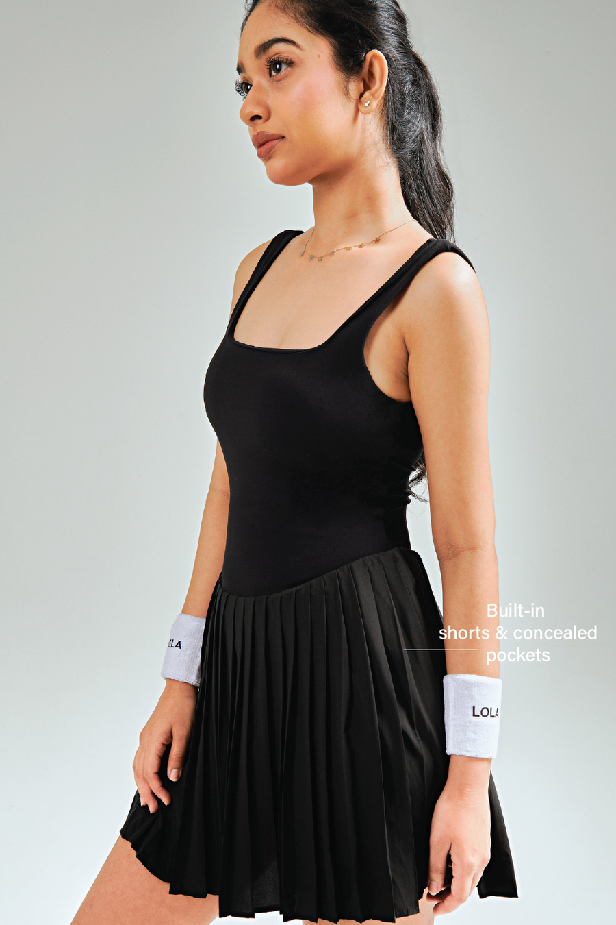 LOLA Malaysia. Malaysia activewear. For golf, pickleball and tennis. Removable bra pad with built in shorts with pocket. 