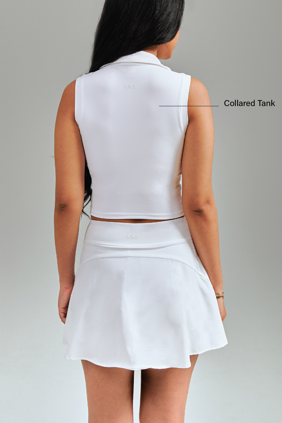 Malaysia comfortable activewear.  High-waist Tennis Skirt with built-in pockets for storage. Mini length hem matches effortlessly with any outfit.